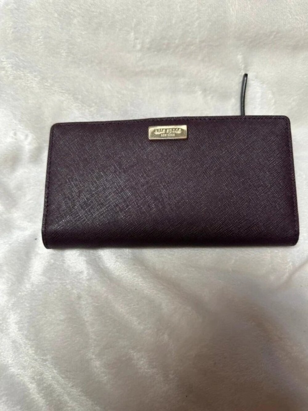 kate spade plum textured zip-around wallet with gold logo